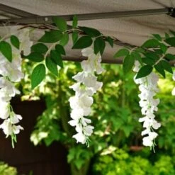 Solar Powered 180cm Artificial Leaf Garland With Wisteria Flowers - Warm White -Big Brand Store 379258 180cm solar powered artificial leaf garland with wisteria flowers 20 warm white micro leds